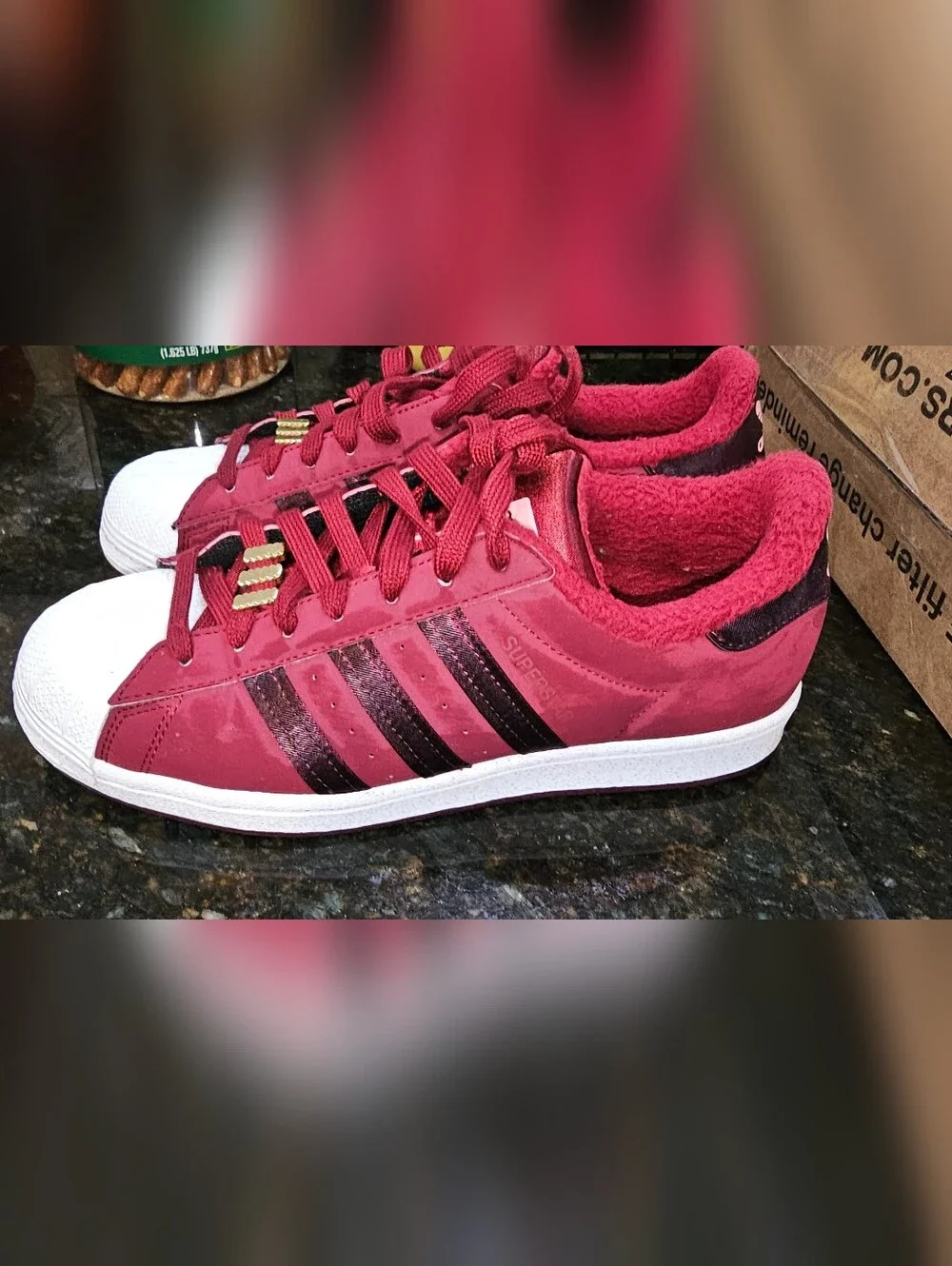 adidas Red Shell Toe Sneakers with Black Stripes